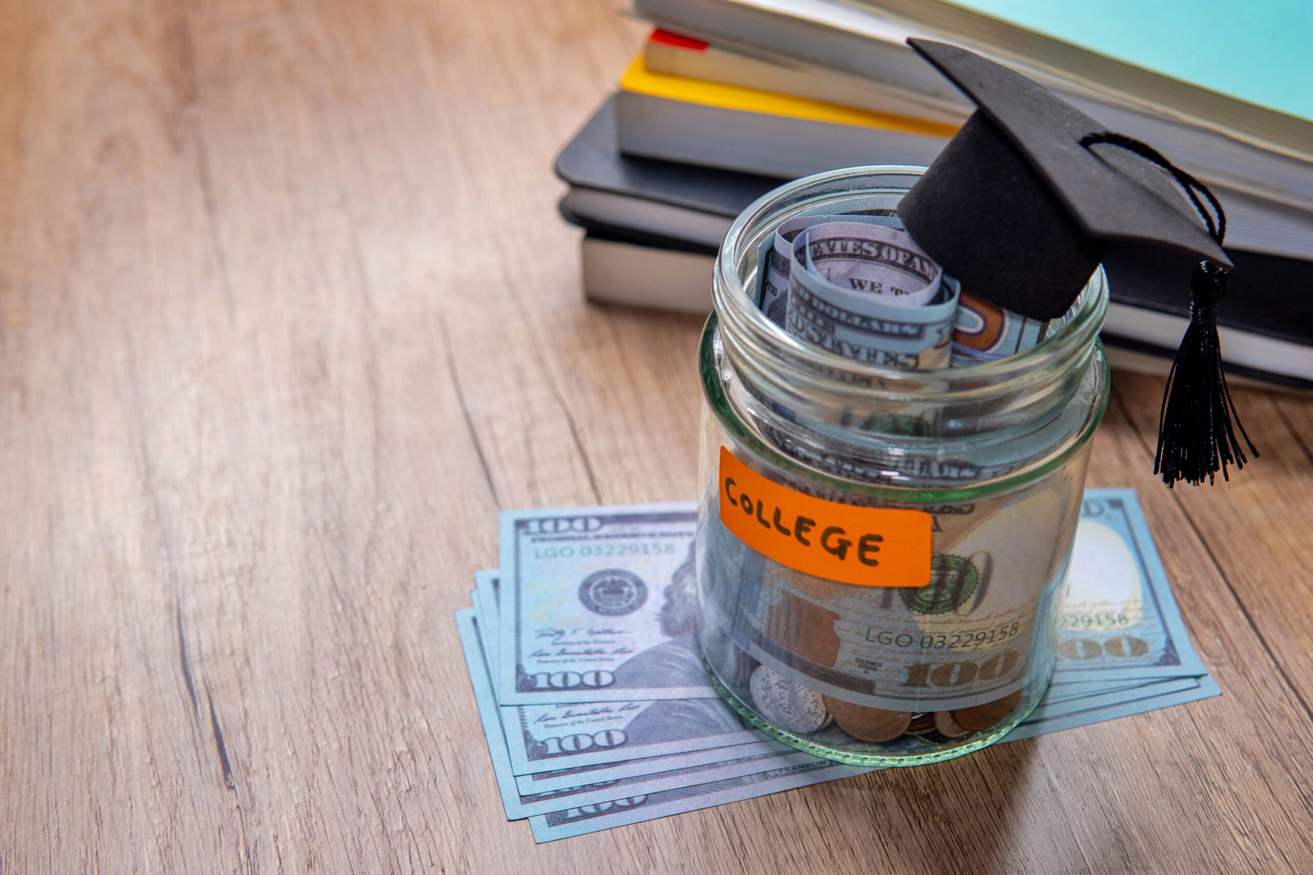 This is an image of money in a jar labelled college